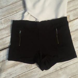 Black shorts with zip pocket designs